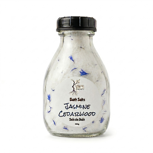 Jasmine Cedarwood Bath Salts by Embody Nature in a glass bottle with black lid